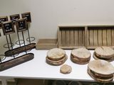 a white table topped with wooden slices of bread
