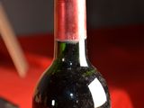 a bottle of wine that is sitting on a table