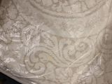 a wedding dress that is wrapped up in plastic