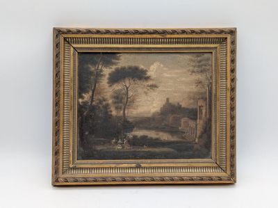 un tableau représentant un paysage, dans un cadre doré, accroché à un mur blanc