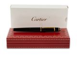 the pen is sitting on top of a red box next to a white box