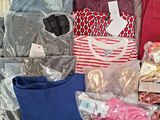 many items that are packed in plastic bags on the table