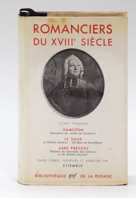 an old book with a picture of a man sitting on a chair