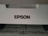 an image of a printer with the word epson on it