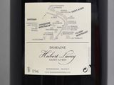 a bottle of wine with a map on the label