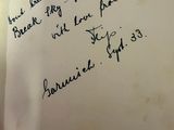 a close up of a piece of paper with writing on it