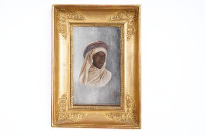 a painting of a woman wearing a headscarf hanging on a wall