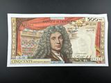 une image représentant un billet de banque sur lequel figure le portrait d'un homme