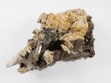 a close up of a piece of rock on a white surface