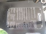 a close up of a motorcycle ' s engine and control panel