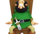 a figurine of a man sitting on a chair