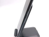 a cell phone that is sitting on top of a stand