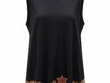 a black top with a paisley pattern on the shoulders