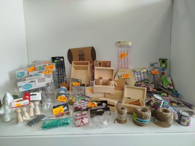 many different items on the shelf in the room