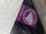 a label on a mattress that says technicique