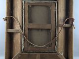 an old wooden box that has a wire in it