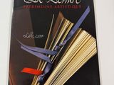the cover of a book with scissors on top of it