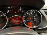 a close up of the dashboard of a car with the gauges on