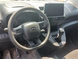 the interior of a car with a steering wheel, dashboard, and dash board