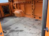 a view of the inside of a van with the door open