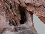 statue of a horse with a bird ' s head on it ' s back