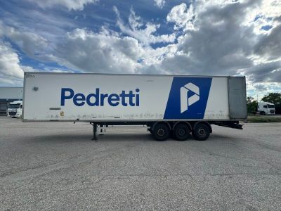 a picture of a semi truck parked in a parking lot