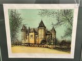 un tableau représentant un château, exposé dans une vitrine