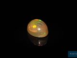 an oplite is shown in the dark with a black background