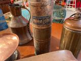 a table that has a lot of old items on it