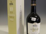 a bottle of wine next to a box of wine
