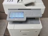 a printer that is sitting on top of a table