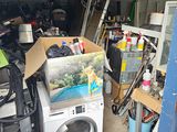 an image of a garage with a washer and dryer in it