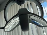 a light that is hanging from a ceiling in a room