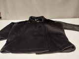the jacket is black and has buttons on the collar