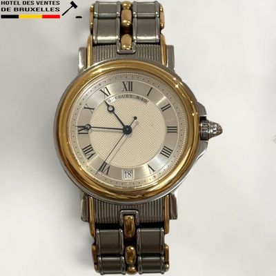 an image of a close up of a wrist watch with roman numerals