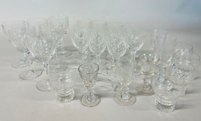 a lot of wine glasses sitting on a table