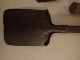 a shovel and a hammer on a table