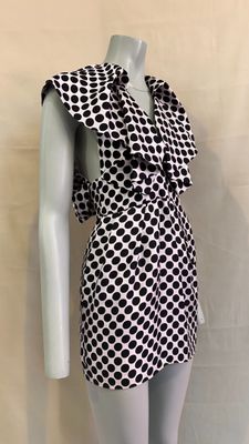 a mannequin mannequin wearing a black and white dress