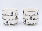 two cups with a picture of a woman and a dog on them
