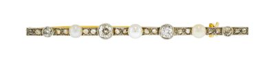 a close up of a bracelet on a white background