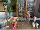 a glass display case with a bunch of stuffed animals in it