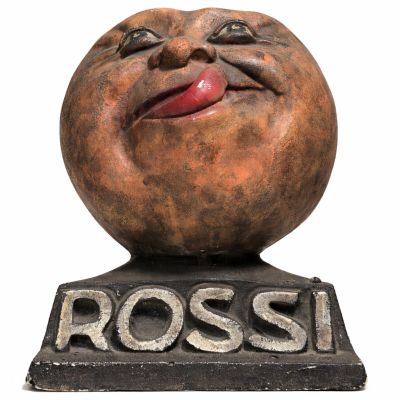 statue of a smiling face on a pedestal with the word rossi written on it
