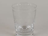 a glass that is sitting on a table