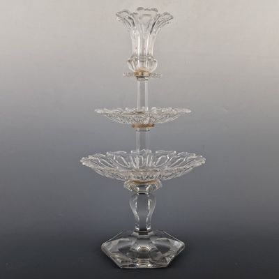 three tiered glass cake stand with a clear base and gold accents