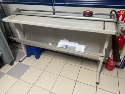 a table with a fire extinguisher on it in a bathroom