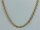 un gros plan sur un collier à chaîne en or porté par un mannequin, un mannequin, un mannequin, un mannequin, un mannequin, un mannequin, un mannequin, un mannequin, un mannequin, un mannequin, un mannequin, un mannequin, un mannequin, un mannequin, un mannequin, un mannequin, un mannequin, un mannequin, un mannequin, un mannequin, un mannequin, un mannequin, un mannequin, un mannequin, un mannequin, un mannequin, un mannequin, un mannequin, un mannequin, un mannequin, un mannequin, un mannequin, un mannequin,