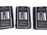 three pairs of black pants in plastic bags on a white surface