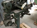 a machine that is sitting on a pallet in a warehouse