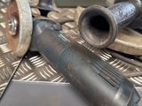a drill and a grinder on a metal table