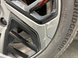 a close up of a tire on a car